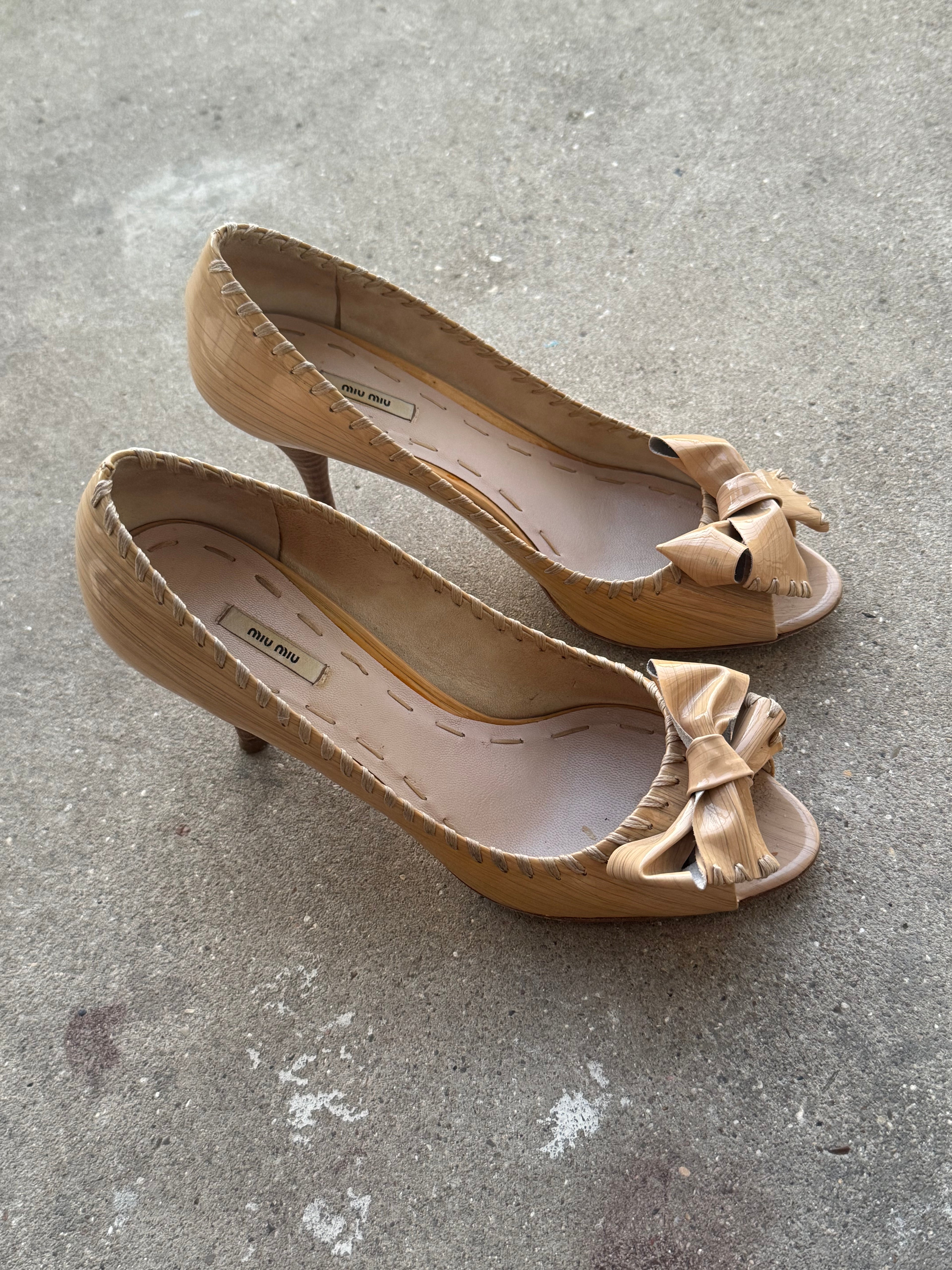 Miu Miu Patent Textured Leather Bow Peep Toe Pumps